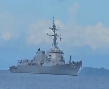 Gravely-in-TT-waters US warship docked at Port of Spain with concerned onlookers