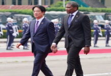 ST. KITTS-PM to make an official visit to Taiwan. Two diplomats from different countries in a tense exchange at an international forum