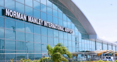 Norman-Manley-airport-1 Norman Manley International Airport terminal with passengers and waived fees announcement