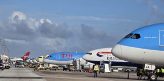 Barbados Airport records peak winter travel day with nearly 10,000 passengers. Barbados airport terminal bustling with winter holiday passengers.