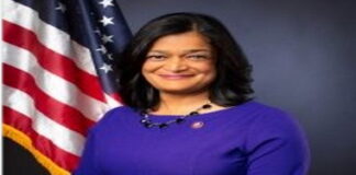 UNITED STATES-Criticism for cancelling immigration applications, citizenship ceremonies for Caribbean nationals Protesters with signs outside USCIS office over cancelled applications