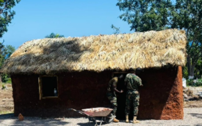 Ghana hands over traditional African houses to Jamaica at Seville Heritage Park March 2026 Jamaica Culture Minister Olivia Grange and Foreign Affairs Minister Kamina Johnson-Smith stand with Ghana Army Colonel Emmanuel Asia at Seville Heritage Park in St Ann during official handover ceremony of two traditional African mud houses with open kitchen constructed by Ghana Army Reconstruction Team