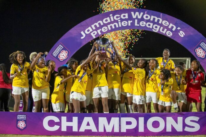 Jamaica Women's Premier League players at media launch celebrating as Christina Hudson PWFJL chairperson announces 12 players secured university scholarships and 2 earned professional contracts from past season