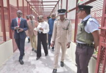 GUYANA-High-level Jamaica delegation visits the main prison in Guyana. Jamaica's Minister of National Security or senior Jamaican delegation member tours the newly rebuilt Lusignan Prison in Guyana with Assistant Director of Prisons Deoraj Gyandat during the Guyana Prison Service Senior Officers Conference on March 18 2026