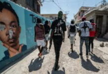 HAITI-US is offering a multi-million dollar reward for information on Haitian gangs. US Department of State Rewards for Justice program poster offering up to $3 million and possible relocation for information on financial activities of Haiti's Viv Ansanm gang coalition and Gran Grif, both designated as Foreign Terrorist Organizations