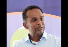 JAMAICA-Calls intensify as tourist resort town awaits critical ambulance service. Concerned citizens holding signs demanding ambulance service in Jamaican resort town