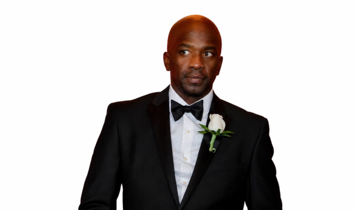 Caribbean community members gathered at candlelight vigil in New York honoring late Jamaican-born chair