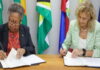CARIBBEAN-CARICOM and Spain advance development cooperation. CARICOM and Spanish officials shaking hands at cooperation signing