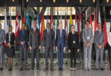 CARIBBEAN-CCJ delegation ends successful visit to Europe. CCJ judges and European court officials shaking hands at conclusion of visit