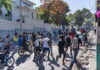 HAITI-IACHR is concerned about the escalating violence in Haiti. IACHR logo with Haiti flag and rising violence graph in background