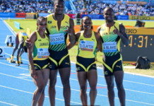 ATHLETICS-Jamaica grabs mixed relay gold in world record time.