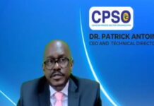 CARIBBEAN-Regional countries urged to look beyond the United States for trading partners. Caribbean trade officials pointing to world map with diverse trade partners highlighted