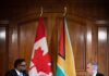 GUYANA-Canada, Guyana leaders emphasize ‘strong’ ties. Canadian and Guyanese leaders shaking hands at bilateral meeting