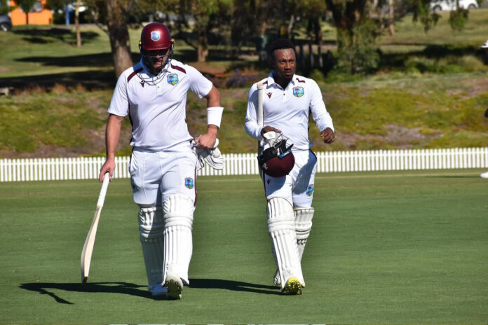 West-Indies-Practice-Match-Da-Silva-left-and-Hodge-depart-the-playing-area-at-the-end-of-day-two-after-recording-an-unbeaten-half-century-stand