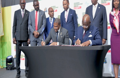 Drew-signing-Afrimex-agreement Prime Minister Dr. Terrance Drew signing Heads of Terms agreement