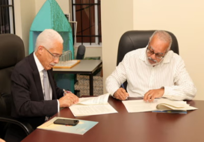 Jules-and-Sunrise-agreement OECS officials and Haitian airline representatives sign MOU