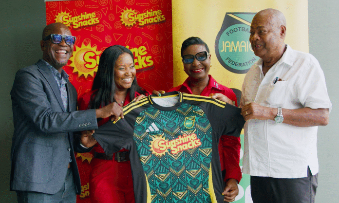 Reggae Boyz football team celebrates on the field