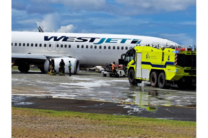 St Maarten airport aircraft landing gear collapse evacuation