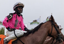 HORSERACING-Husbands captures fourth jockey title at Fort Erie. Jockey Patrick Husbands holding trophy after winning title at Fort Erie racetrack