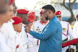 Guyana President Confers Medals and Ranks on GDF Personnel President of Guyana presenting military medals to Guyana Defence Force officers at ceremony
