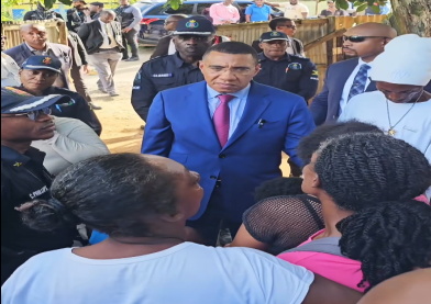 Holness-meeting-victims-of-Oct-6-murders