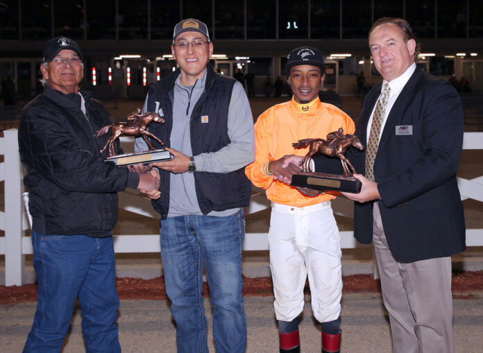Racing-photo Barbadian jockey Bynoe celebrates victory alongside Keplin Jr. after being crowned first-time champions at the ASD finale.
