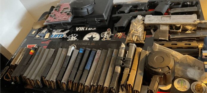 Seized-guns-and-ammunition-destined-for-are-put-on-show-by-US-authorities. United Nations Security Council members meet to discuss sanctions amid escalating gang violence in Haiti.