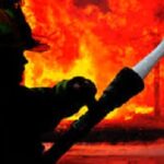 BELIZE-Mother and son killed in early morning blaze, arsonist detained. Forensic investigators at the scene of a fatal house fire in Belize.