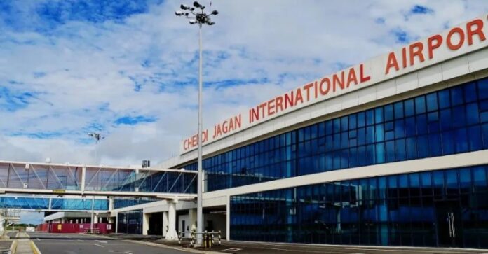 Cheddi Jagan Airport's Rescue and Firefighting Rating Downgraded Emergency vehicles parked at Cheddi Jagan International Airport with terminal in background