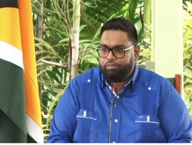 Guyana Government to Roll Out Citizen Support Packages Guyanese government officials distributing support packages to citizens