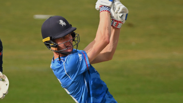 England cricketers Dawkins and Mohammed celebrating match-winning partnership.