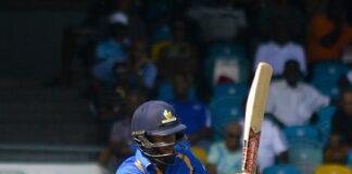 CRICKET-LEAD Pride smoke Volcanoes to record second straight win. Barbados Pride team celebrating CPL cricket victory.