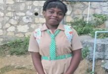 JAMAICA-Police charge father with the murder of his teenage daughter. Jamaican police escorting a detained father in a murder investigation