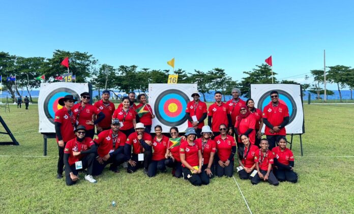 Guyanese archer aiming bow at target during record-breaking championship performance