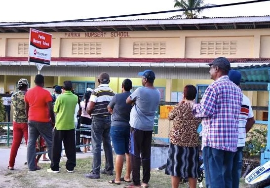 UNDP Hails Guyana Election Historic Moment UNDP officials reviewing Guyana election results with local authorities.