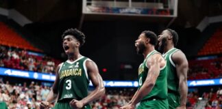 BASKETBALL-Jamaica storms San Juan, completes historic sweep of Puerto Rico. Jamaica national basketball team celebrating historic victory over Puerto Rico.