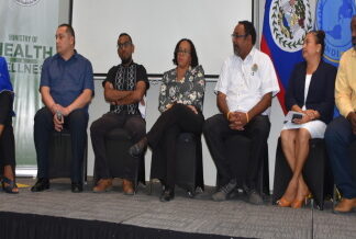 BELIZE-Belize discussing alcohol-related harm at national symposium.