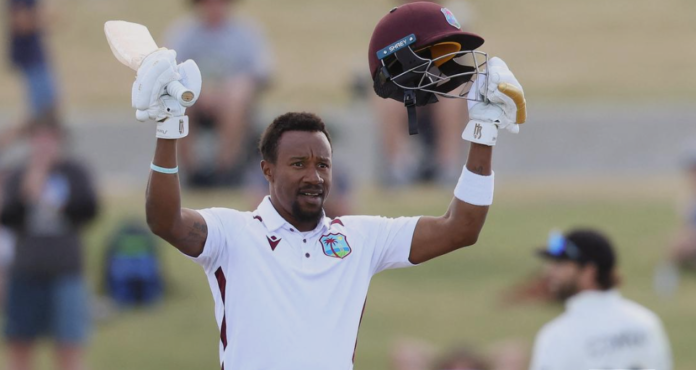 West Indies batsman Kavem Hodge celebrating Test century against New Zealand.