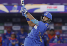 CRICKET-Pooran’s half-century powers Emirates past Giants Nicholas Pooran celebrating half-century in ILT20 cricket match.