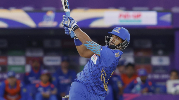 Nicholas Pooran celebrating half-century in ILT20 cricket match.