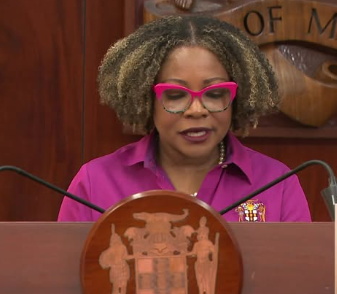 Dana-Morris-Dixon Jamaican students walking to school past hurricane-damaged buildings