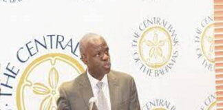 BAHAMAS-Rolle reappointed central bank governor.