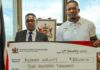 ATHLETICS-Walcott receives a $500,000 reward from the government.