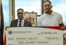 ATHLETICS-Walcott receives a $500,000 reward from the government.