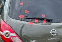 ST. VINCENT-Police hunt for suspects after kidnapping victims rescued from bullet-ridden car.