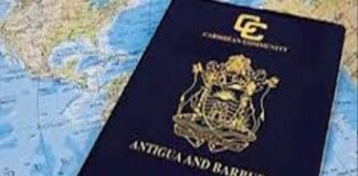 ANTIGUA–Government considering stricter measures for lost passports. Antigua and Barbuda Passport Office official reviews documents as government considers stricter measures including higher fees and longer waiting periods following surge in lost passport reports