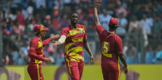 CRICKET-LEAD Holder leads Windies past hapless Nepal and into Super Eights. West Indies all-rounder Jason Holder celebrates taking a wicket during Player of the Match performance of 4-27 against Nepal at ICC T20 World Cup 2026 in Mumbai