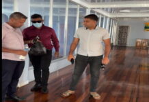 GUYANA-Opposition leader condemns police search of his business premises.