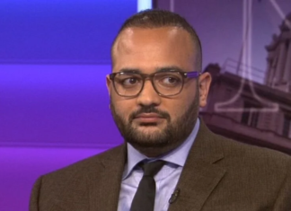 UNITED STATES-Advocates call for immediate passage of legislation to protect Caribbean immigrants. Caribbean immigrant advocates and community leaders rally outside US Capitol in Washington DC calling for immediate passage of legislation to protect Caribbean immigrants with signs supporting immigration reform