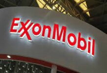 GUYANA-ExxonMobil launches multi-million dollar science, math initiative for Guyana. President Dr Irfaan Ali and ExxonMobil CEO Darren Woods shake hands at State House launch of US$100 million STEM education initiative for Guyana